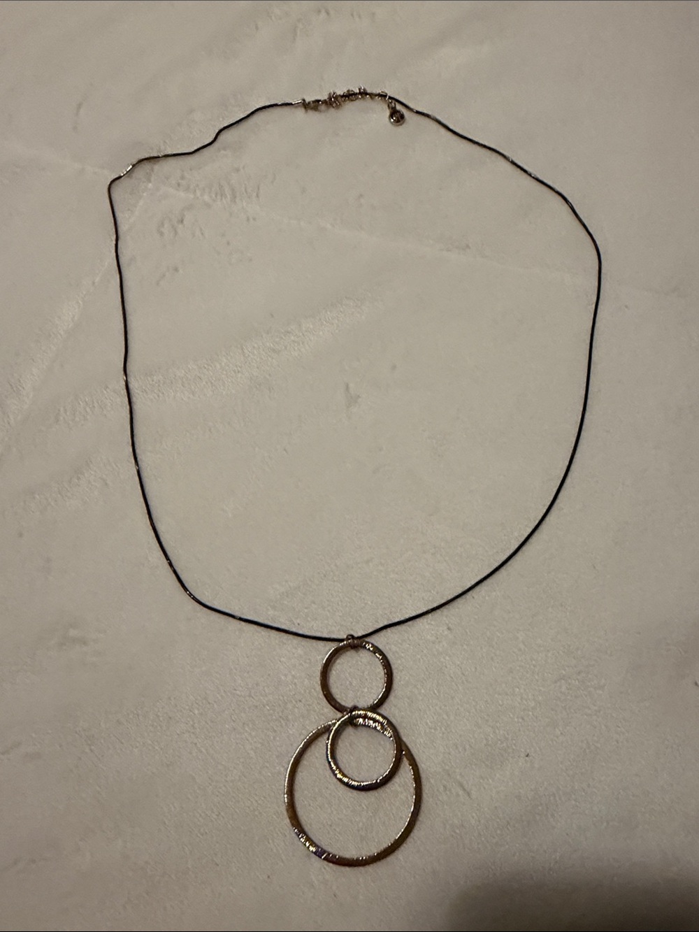 Vintage 1946 Gold Triple Circle Pendant on Black Cord